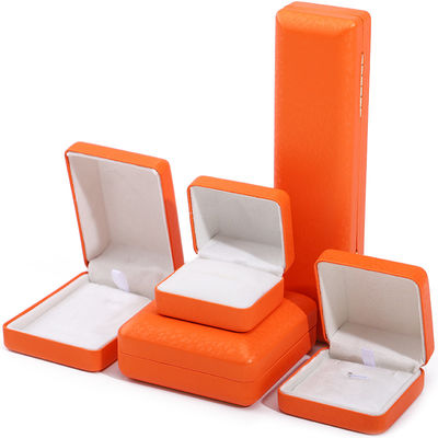 kopen Custom logo rechthoekige oranje leren sieraden doos voor luxe armband halsketting opslag online manufacture