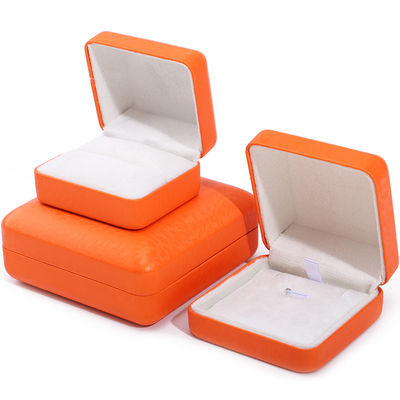 Custom logo rechthoekige oranje leren sieraden doos voor luxe armband halsketting opslag