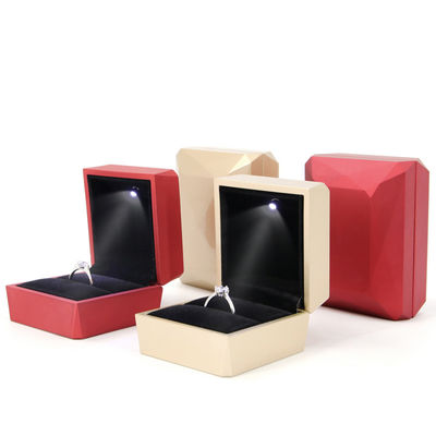 Custom logo fluweel bekleed plastic sieraden opslagdoos met LED-licht en fluweel bekleding