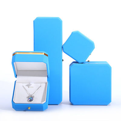 Blauwe PU lederen cadeauwrap juwelen doos voor Hanhong achthoekige metalen knop Custom logo