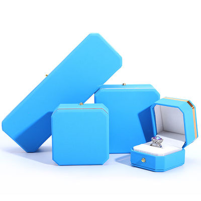 Blauwe PU lederen cadeauwrap juwelen doos voor Hanhong achthoekige metalen knop Custom logo