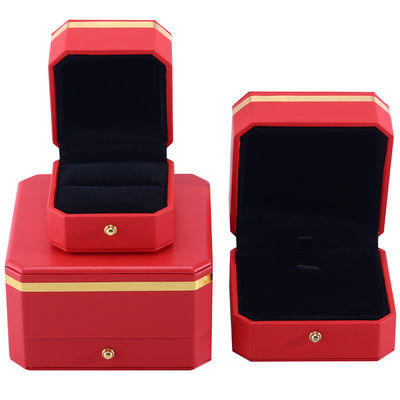 kopen Opvallende rode achthoekige PU-leer luxe verpakkingsdoos met gouden afwerking online manufacture