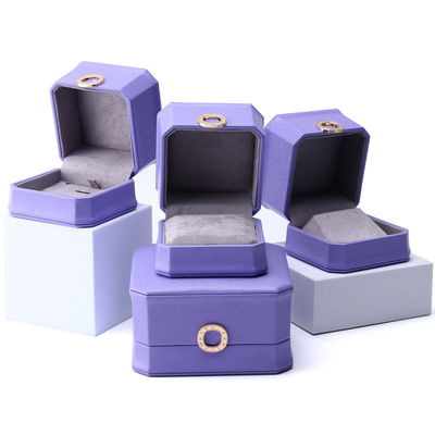 Geweldige paarse octogonale PU-leer sieraden doos voor ring oorstokjes hanger