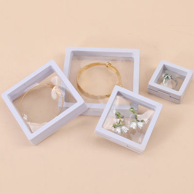 kopen Plain White PE Membrane Suspension Box Plastic Floating Jewelry Case Transparent online manufacture